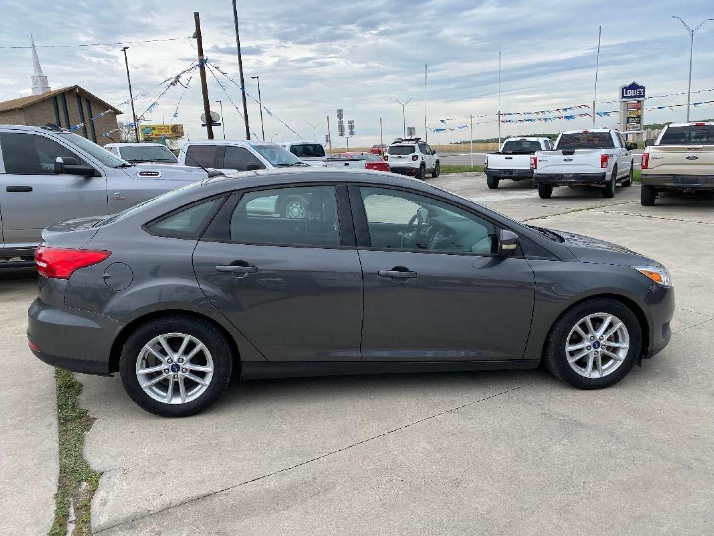 2017 Grey /Black Ford Focus (1FADP3F2XHL) , located at 1687 Business 35 S, New Braunfels, TX, 78130, (830) 625-7159, 29.655487, -98.051491 - Photo#4